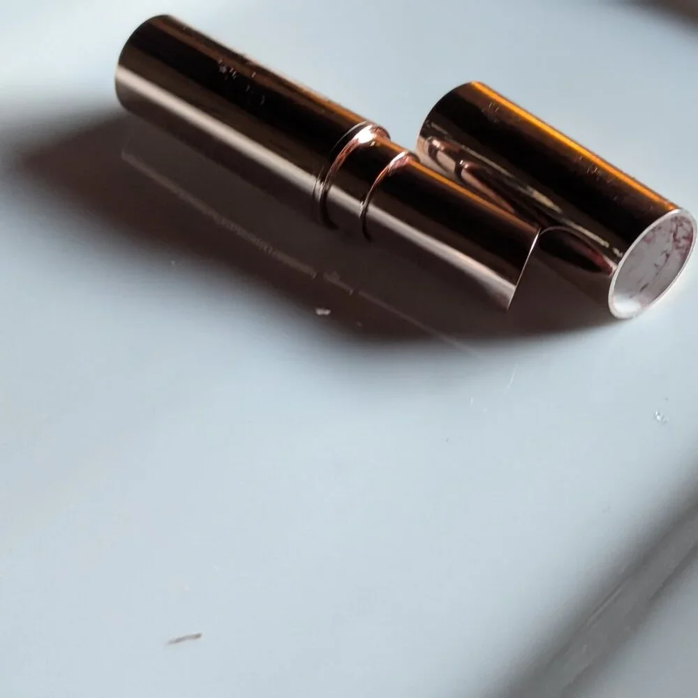 goop Beauty | Clean Nourishing Lip Balm | Garnet: a translucent deep burgundy